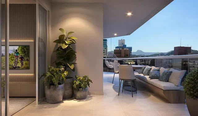 Varanda com sofá, plantas e vista da cidade no Gustavo Mares Guia, perspectiva ilustrativa